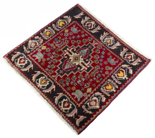 Corner detail of 2000s Shiraz rug showing border pattern and Wool pile