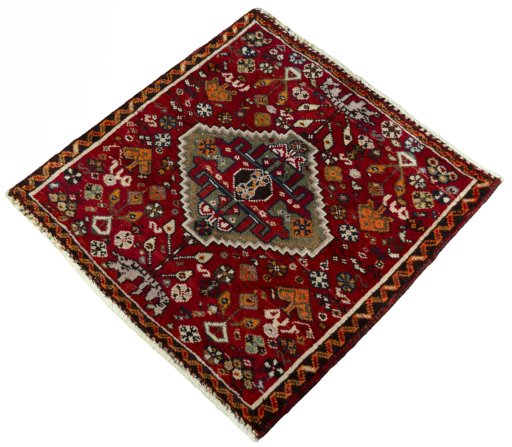 Corner detail of 2000s Shiraz rug showing border pattern and Wool pile