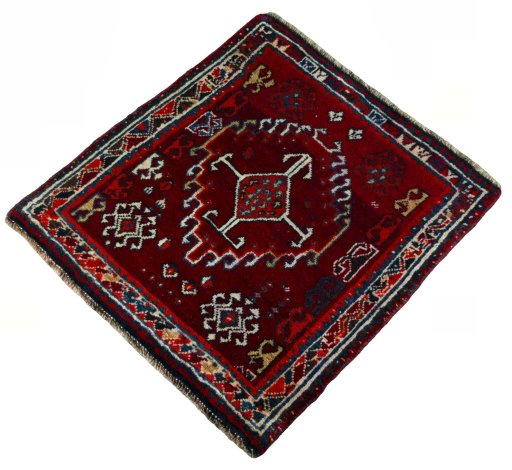 Corner detail of 2000s Shiraz rug showing border pattern and Wool pile