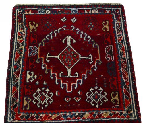 Surface texture of 2000s Shiraz rug with natural Wool and intricate pattern