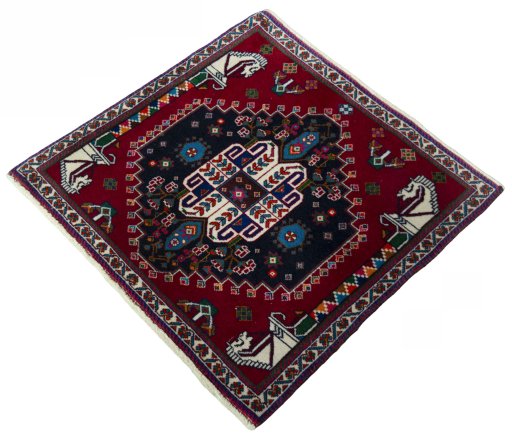 Corner detail of 2000s Shiraz rug showing border pattern and Wool pile