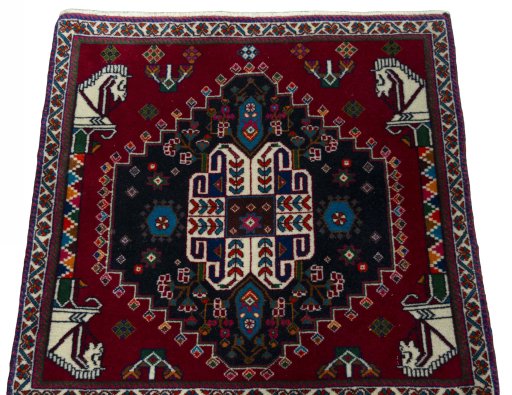 Surface texture of 2000s Shiraz rug with natural Wool and intricate pattern