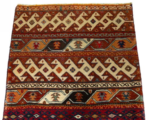 Surface texture of 2000s Shiraz rug with natural Wool and intricate pattern