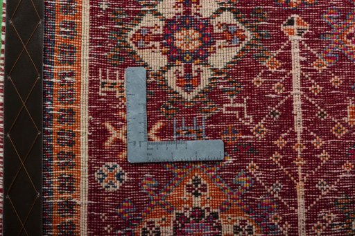 Backside of handmade 2000s Shiraz rug showing knot structure and weave density