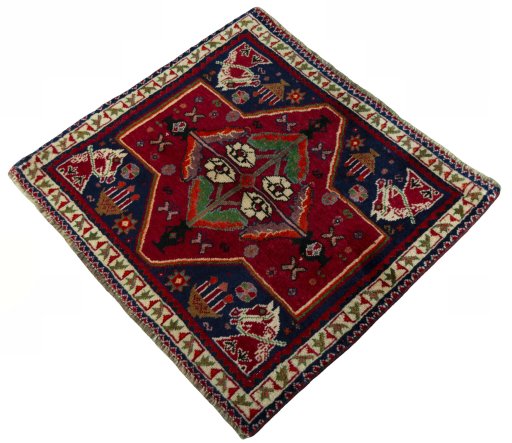 Corner detail of 2000s Shiraz rug showing border pattern and Wool pile