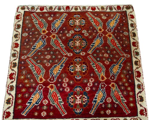 Surface texture of 2000s Shiraz rug with natural Wool and intricate pattern
