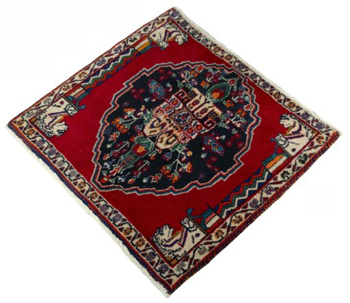 Corner detail of 2000s Shiraz rug showing border pattern and Wool pile