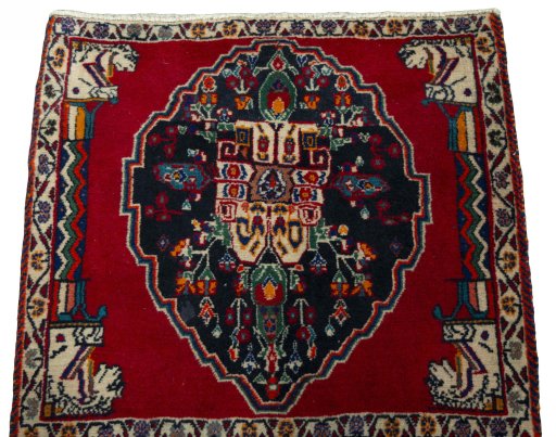 Surface texture of 2000s Shiraz rug with natural Wool and intricate pattern