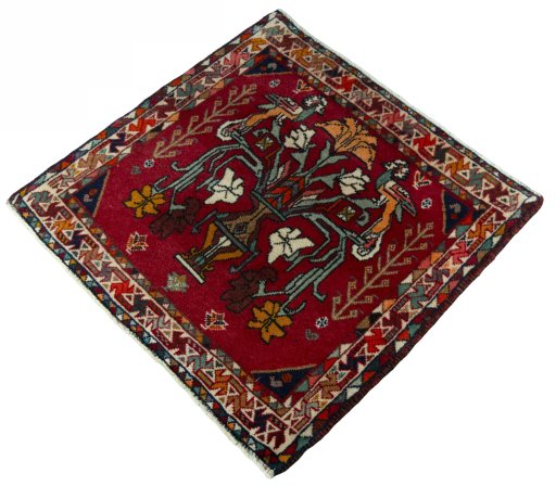 Corner detail of 2000s Shiraz rug showing border pattern and Wool pile
