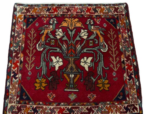 Surface texture of 2000s Shiraz rug with natural Wool and intricate pattern