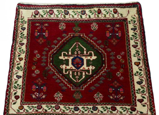 Surface texture of 2000s Shiraz rug with natural Wool and intricate pattern