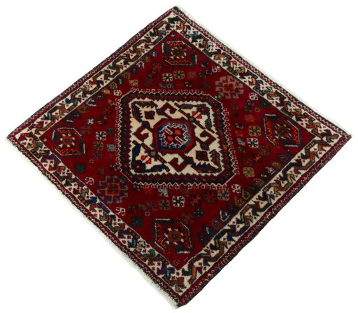 Corner detail of 2000s Shiraz rug showing border pattern and Wool pile