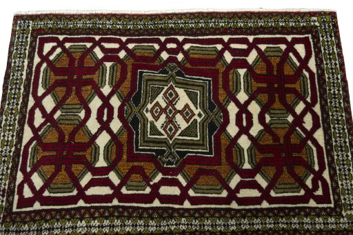 Surface texture of 2000s Shiraz rug with natural Wool and intricate pattern