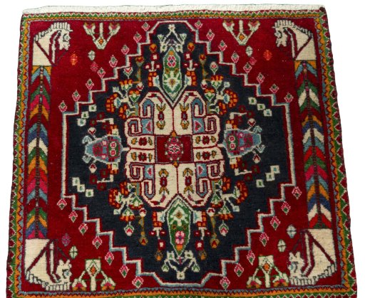 Surface texture of 2000s Shiraz rug with natural Wool and intricate pattern