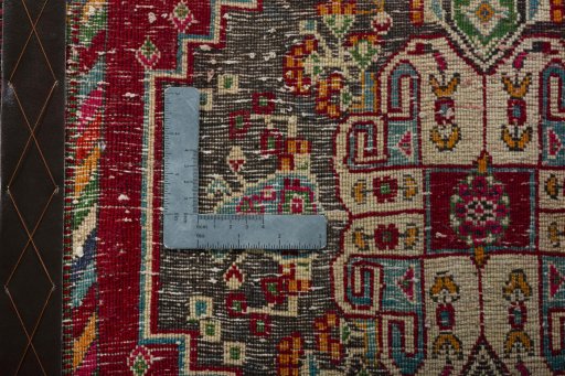 Backside of handmade 2000s Shiraz rug showing knot structure and weave density