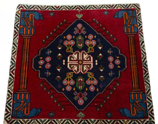 Surface texture of 2000s Shiraz rug with natural Wool and intricate pattern