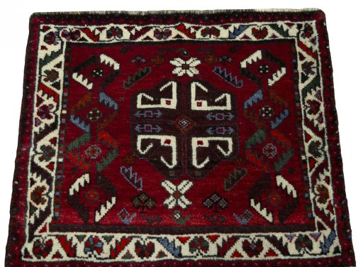 Surface texture of 2000s Shiraz rug with natural Wool and intricate pattern