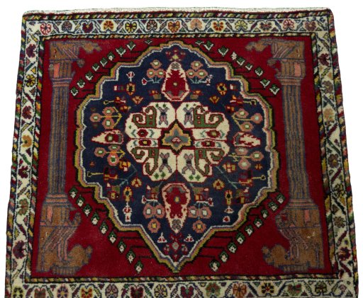 Surface texture of 2000s Shiraz rug with natural Wool and intricate pattern