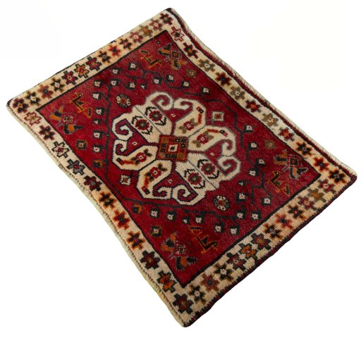 Corner detail of 2000s Shiraz rug showing border pattern and Wool pile