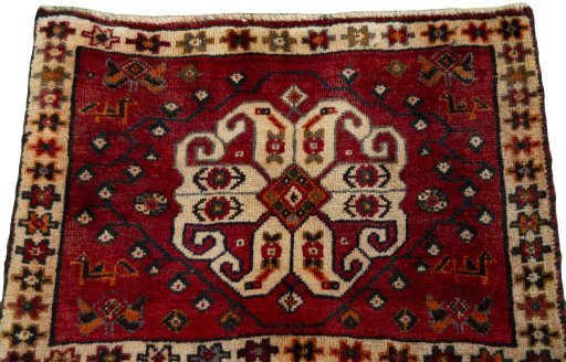 Surface texture of 2000s Shiraz rug with natural Wool and intricate pattern