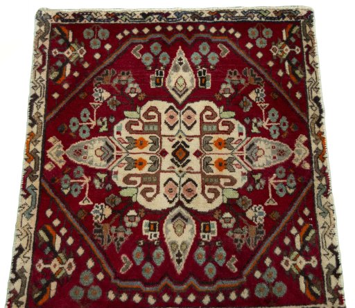 Surface texture of 2000s Shiraz rug with natural Wool and intricate pattern