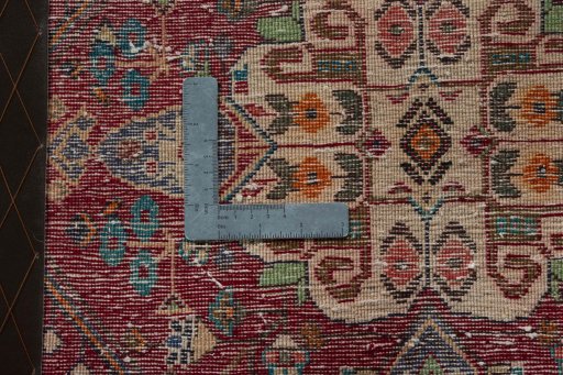 Backside of handmade 2000s Shiraz rug showing knot structure and weave density