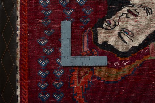 Backside of handmade 2000s Shiraz rug showing knot structure and weave density