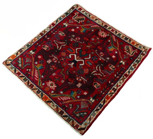 Corner detail of 2000s Shiraz rug showing border pattern and Wool pile