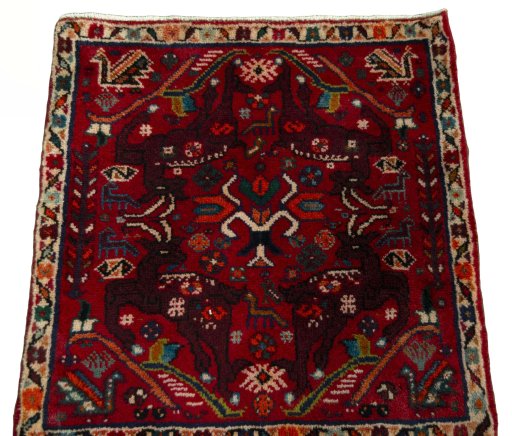 Surface texture of 2000s Shiraz rug with natural Wool and intricate pattern