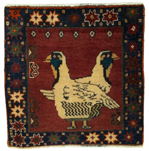 Full view of 2000s Shiraz rug from Iran / Persia, 59 × 60 cm in Red tones