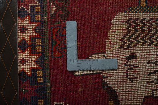 Backside of handmade 2000s Shiraz rug showing knot structure and weave density