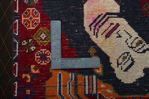 Backside of handmade 2000s Shiraz rug showing knot structure and weave density
