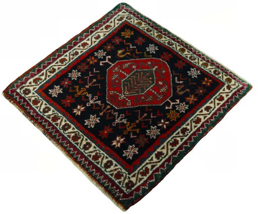 Corner detail of 2000s Shiraz rug showing border pattern and Wool pile
