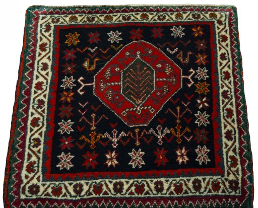Surface texture of 2000s Shiraz rug with natural Wool and intricate pattern