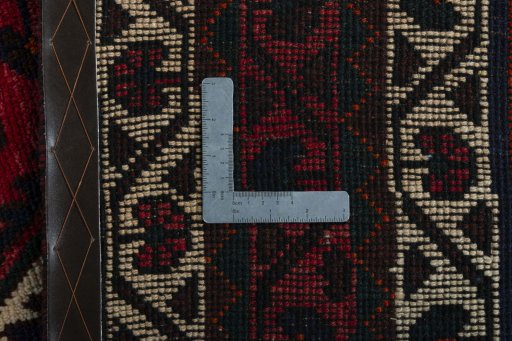 Surface texture of 2000s Shiraz rug with natural Wool and intricate pattern