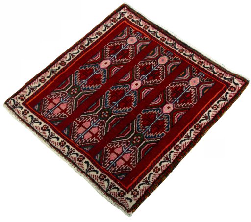 Corner detail of 2000s Shiraz rug showing border pattern and Wool pile