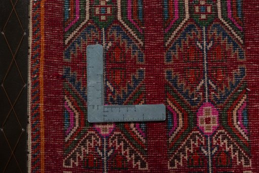 Backside of handmade 2000s Shiraz rug showing knot structure and weave density