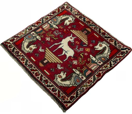 Corner detail of 2000s Shiraz rug showing border pattern and Wool pile