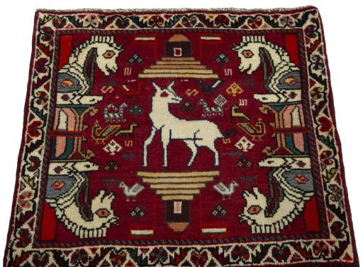 Surface texture of 2000s Shiraz rug with natural Wool and intricate pattern