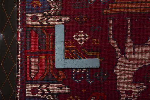 Backside of handmade 2000s Shiraz rug showing knot structure and weave density