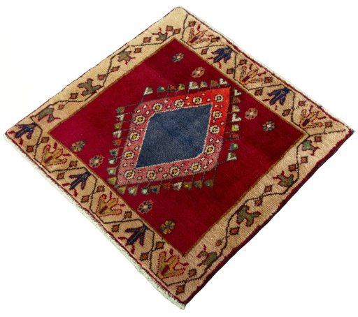 Corner detail of 2000s Shiraz rug showing border pattern and Wool pile