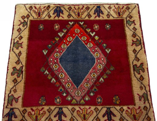 Surface texture of 2000s Shiraz rug with natural Wool and intricate pattern