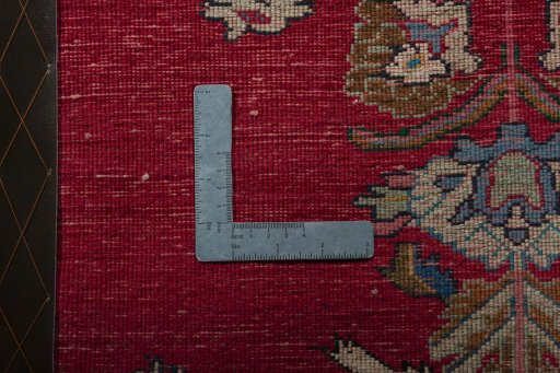 Backside of handmade 2000s Shiraz rug showing knot structure and weave density