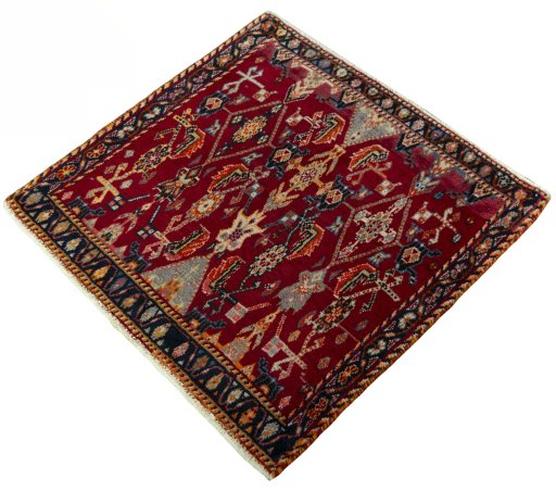 Corner detail of 2000s Shiraz rug showing border pattern and Wool pile
