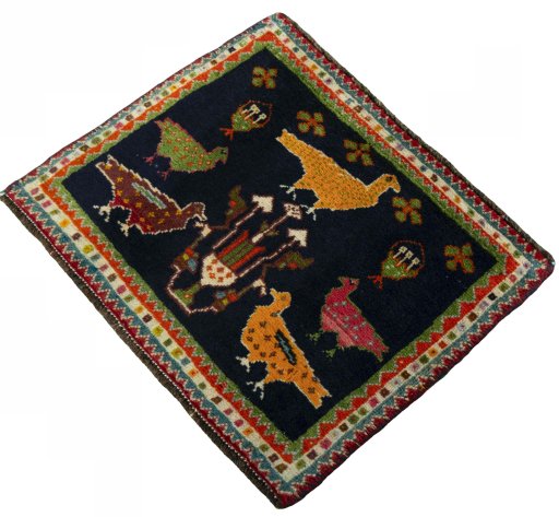 Corner detail of 2000s Shiraz rug showing border pattern and Wool pile