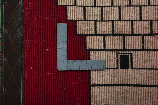 Backside of handmade 2000s Shiraz rug showing knot structure and weave density