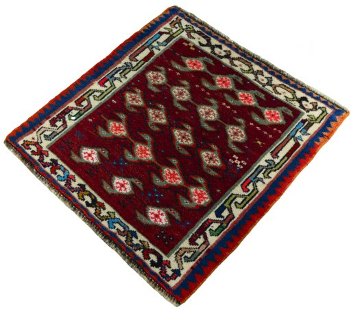 Corner detail of 2000s Shiraz rug showing border pattern and Wool pile