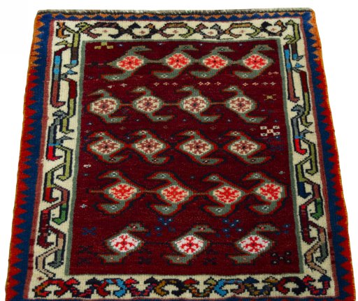 Surface texture of 2000s Shiraz rug with natural Wool and intricate pattern