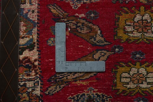 Backside of handmade 2000s Shiraz rug showing knot structure and weave density