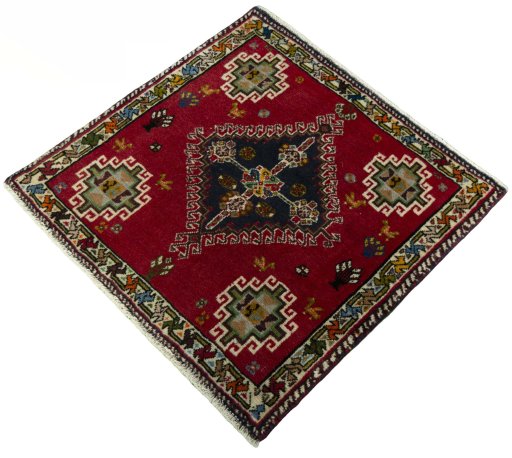 Corner detail of 2000s Shiraz rug showing border pattern and Wool pile